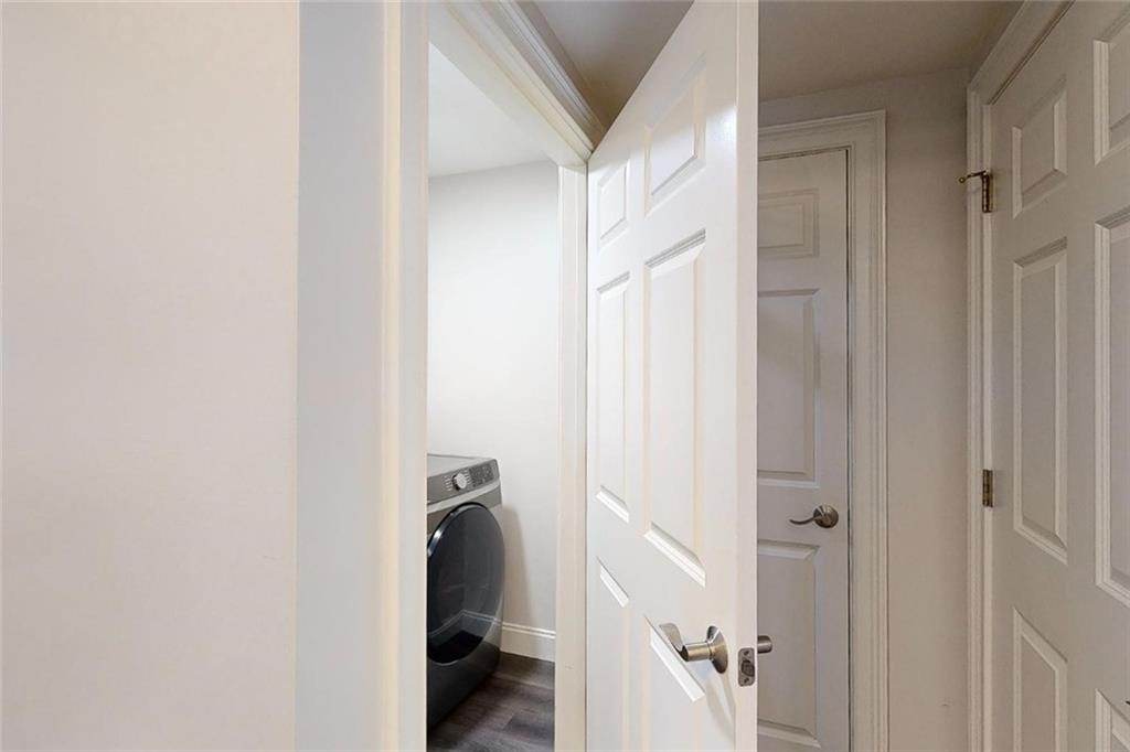 3275 Lenox Road Northeast, Unit 413 Atlanta, GA 30324 - Photo 27 of 52 a view of a hallway with a closet and a room