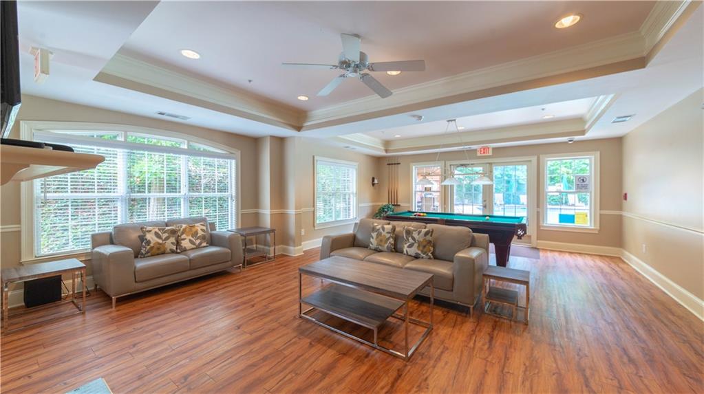 3275 Lenox Road Northeast, Unit 413 Atlanta, GA 30324 - Photo 43 of 52 a living room with furniture and a large window