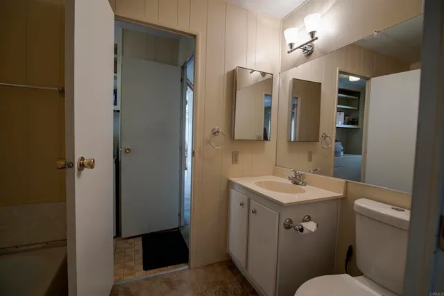 a bathroom with a tub and shower