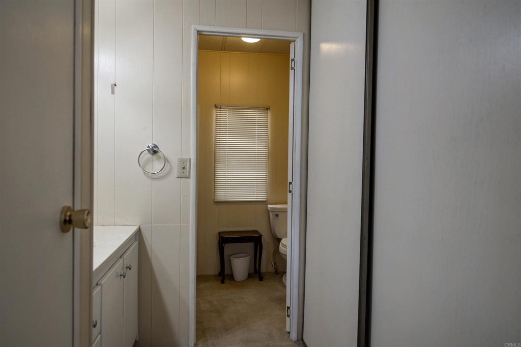 1010 Palm Canyon Drive, Unit 159 Borrego Springs, CA 92004 - Photo 15 of 25 a view of a bathroom from a hallway