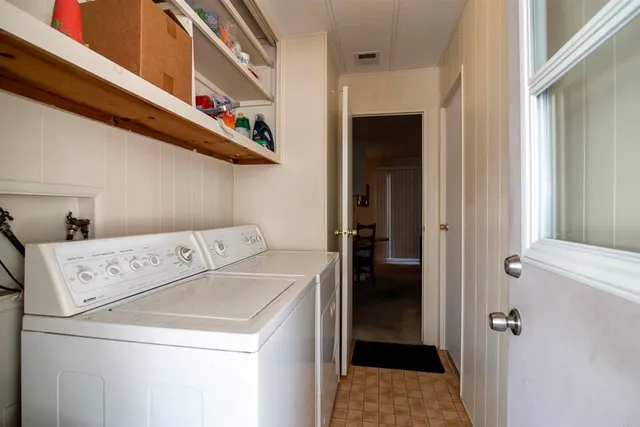 a view of a playground with basketball court