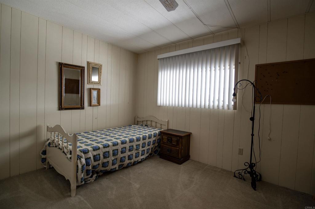 1010 Palm Canyon Drive, Unit 159 Borrego Springs, CA 92004 - Photo 10 of 25 a bedroom with bed and window