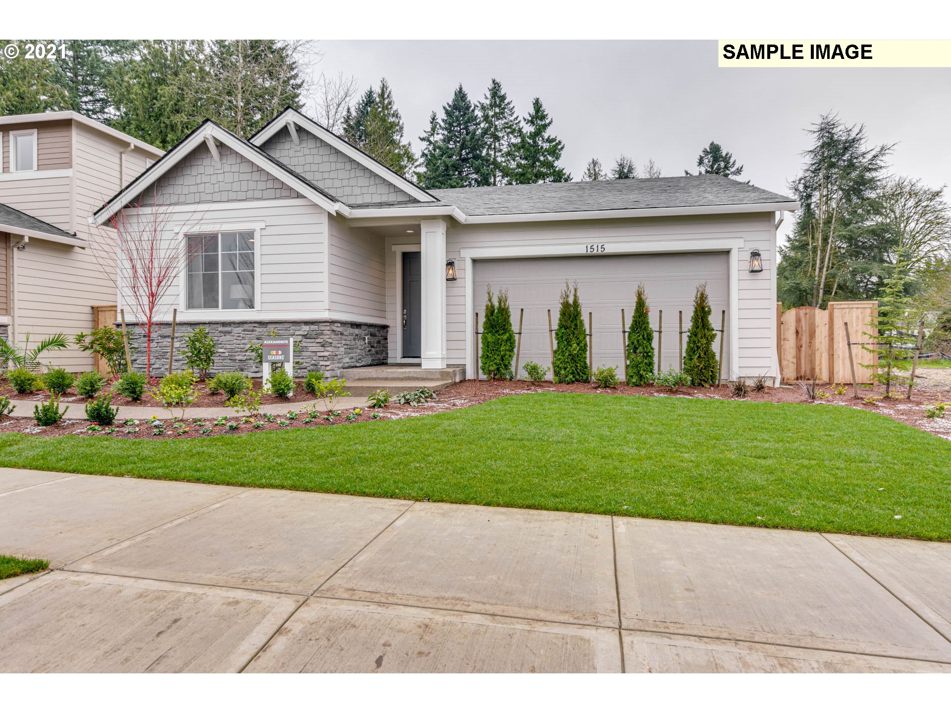 2940 North Mccanta Way Ridgefield, WA 98642 - Photo 1 of 1 a front view of a house with a yard and garage