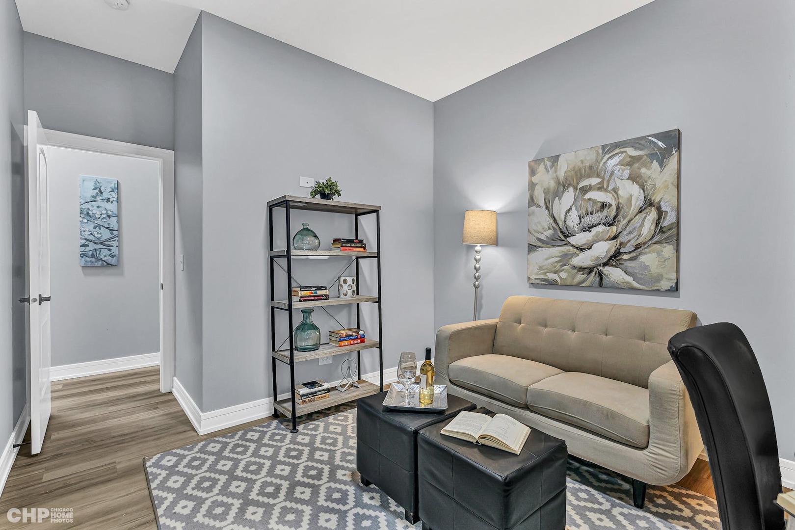 3920 South Calumet Avenue, Unit 2 Chicago, IL 60653 - Photo 21 of 24 a living room with furniture and a couch