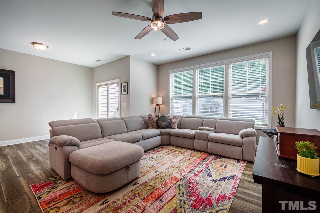 1007 Longitude Drive Durham, NC 27713 - Photo 14 of 35 a living room with furniture and windows
