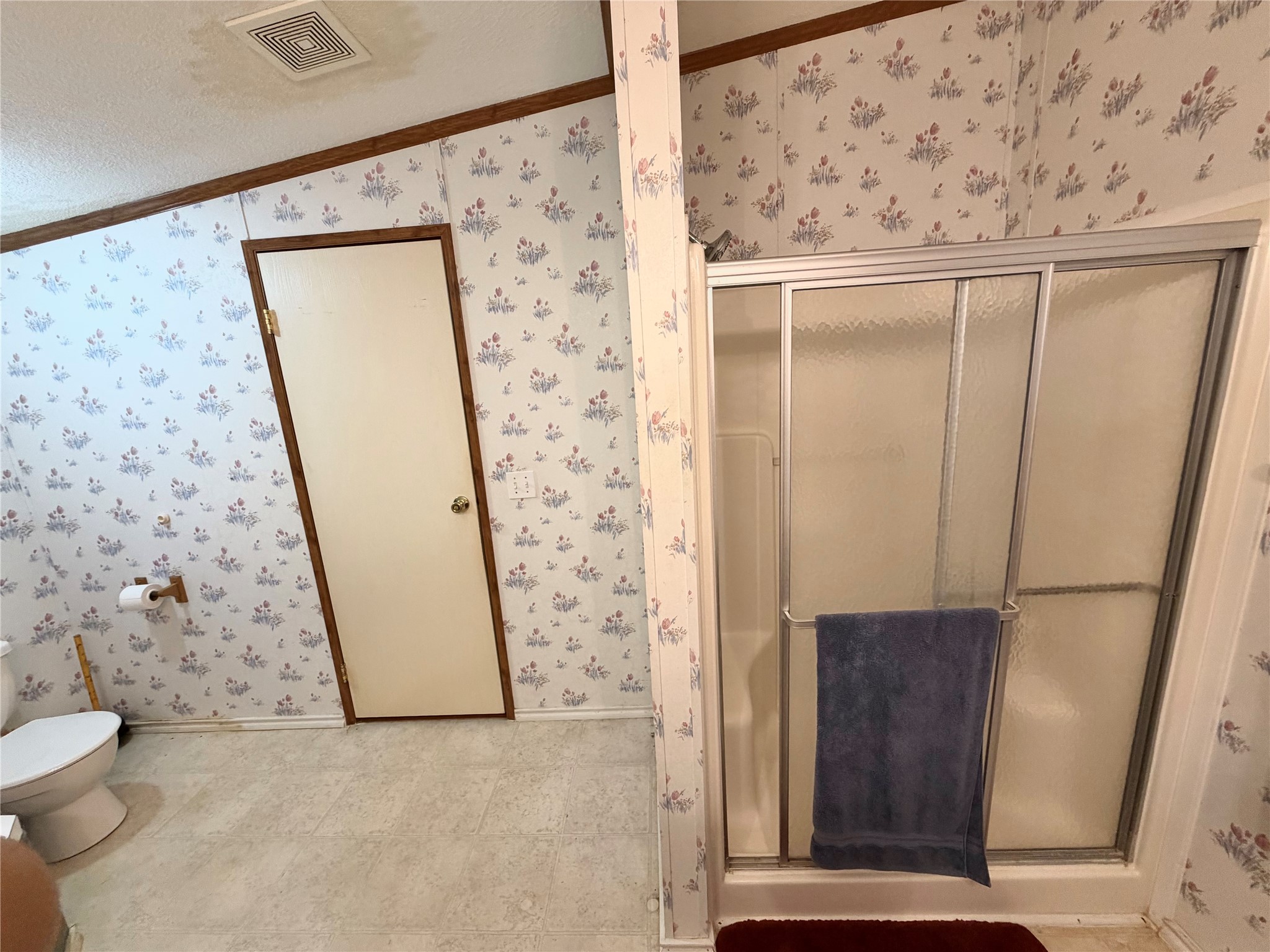 153 Prairie Lea Drive Angleton, TX 77515 - Photo 27 of 30 a bathroom with a granite countertop sink a toilet and a shower