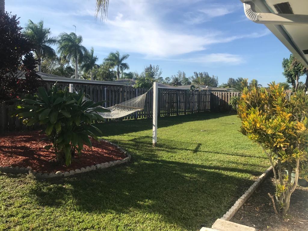 22307 Doran Avenue Boca Raton, FL 33428 - Photo 2 of 25 a view of a golf course with a tree