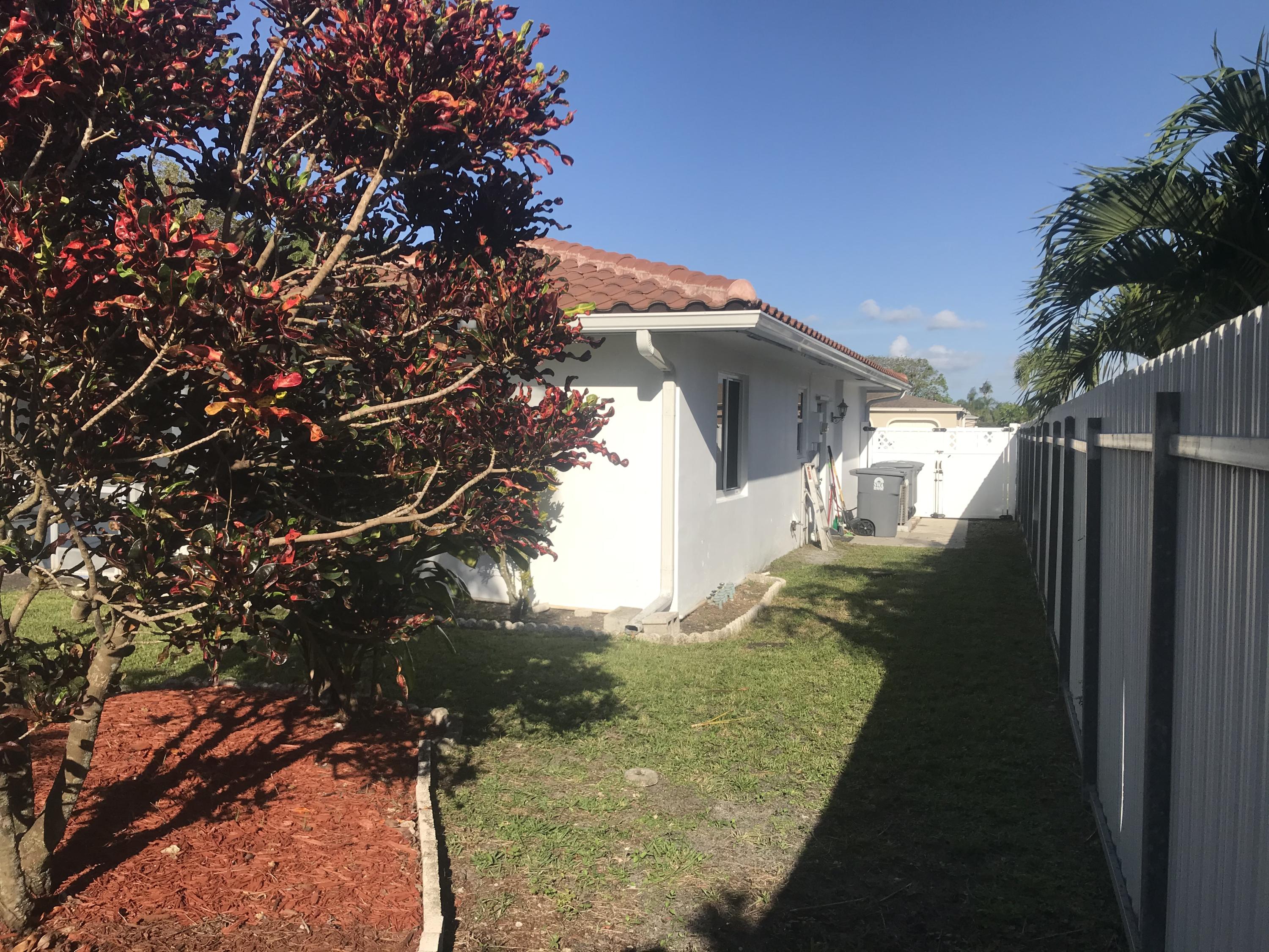22307 Doran Avenue Boca Raton, FL 33428 - Photo 23 of 25 a backyard of a house