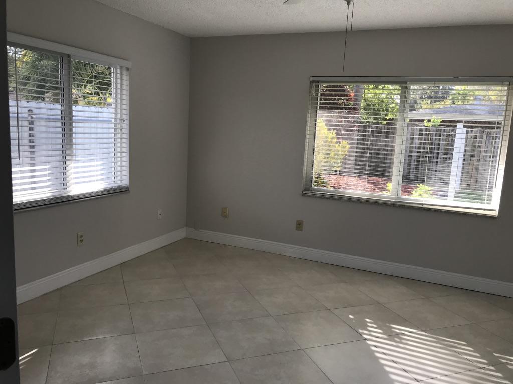 22307 Doran Avenue Boca Raton, FL 33428 - Photo 8 of 25 a view of an empty room with a window