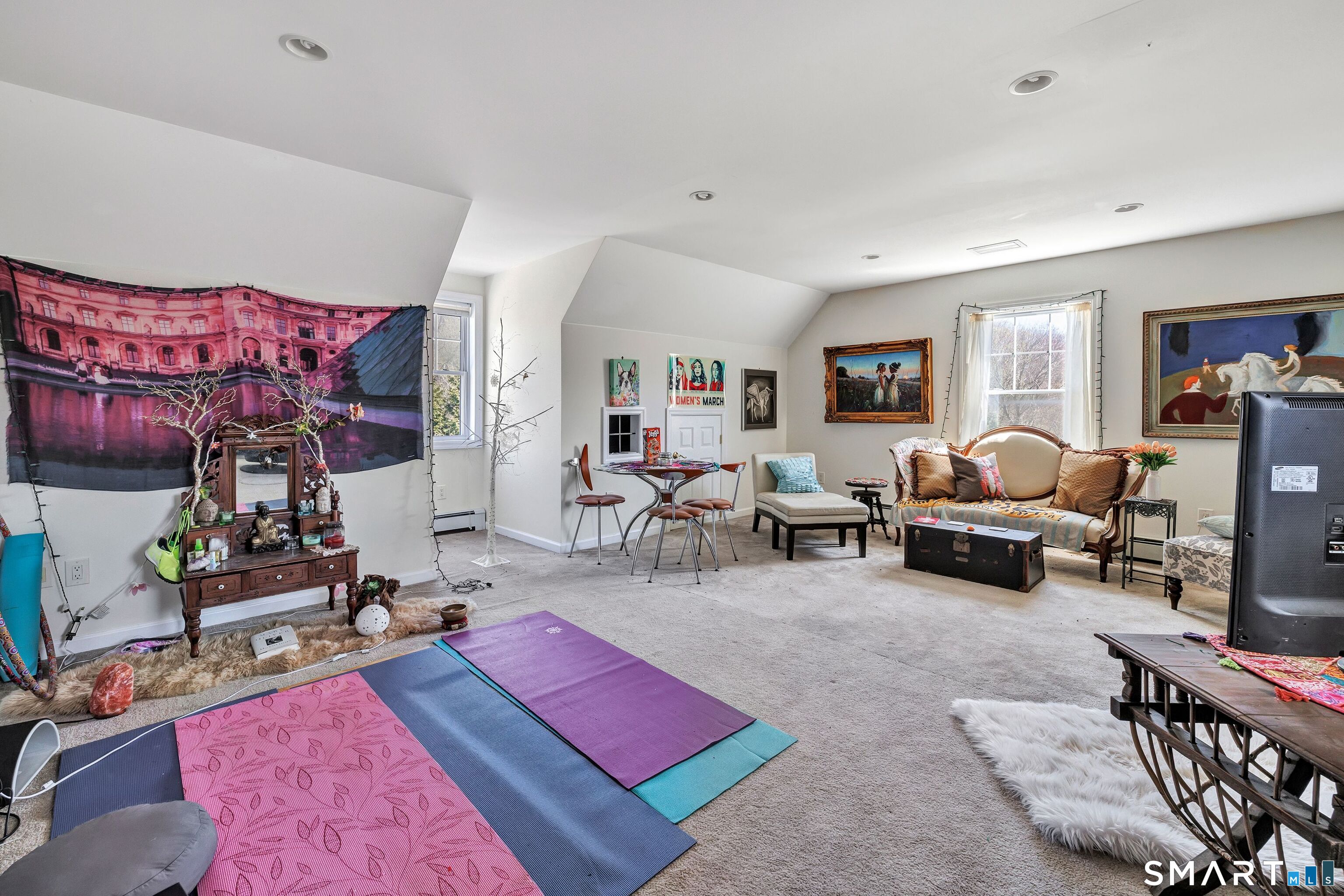 25 Starrs Ridge Road Redding, CT 06896 - Photo 32 of 38 A beautifully finished 3rd floor expands the home's living space with a generously sized bonus room suited for recreation, au-pair, fitness, media, or creative pursuits, complemented by an additional bedroom and full bath.