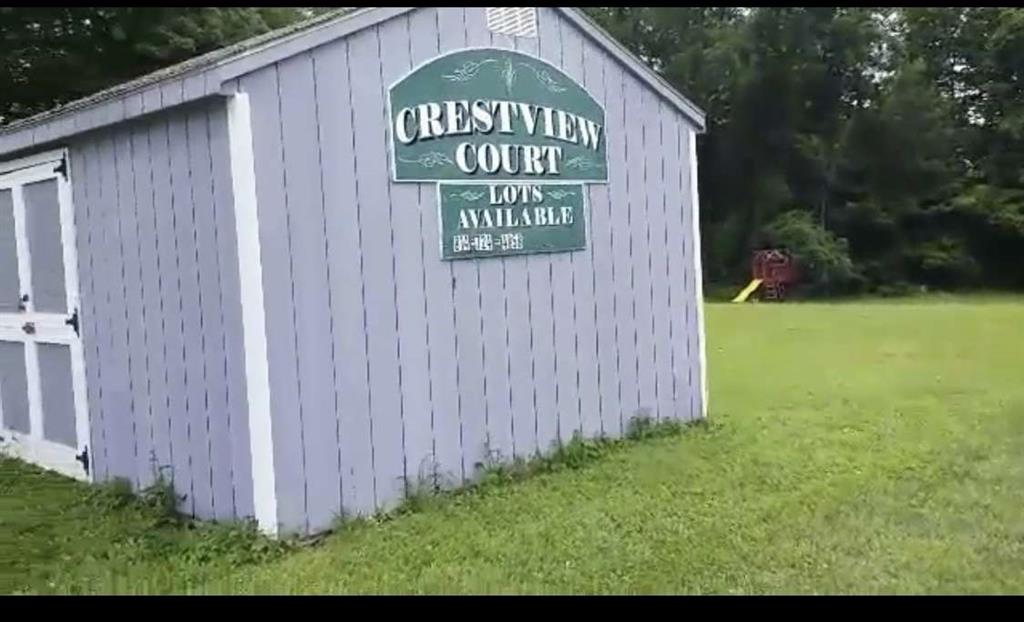 a view of a wooden door of the house