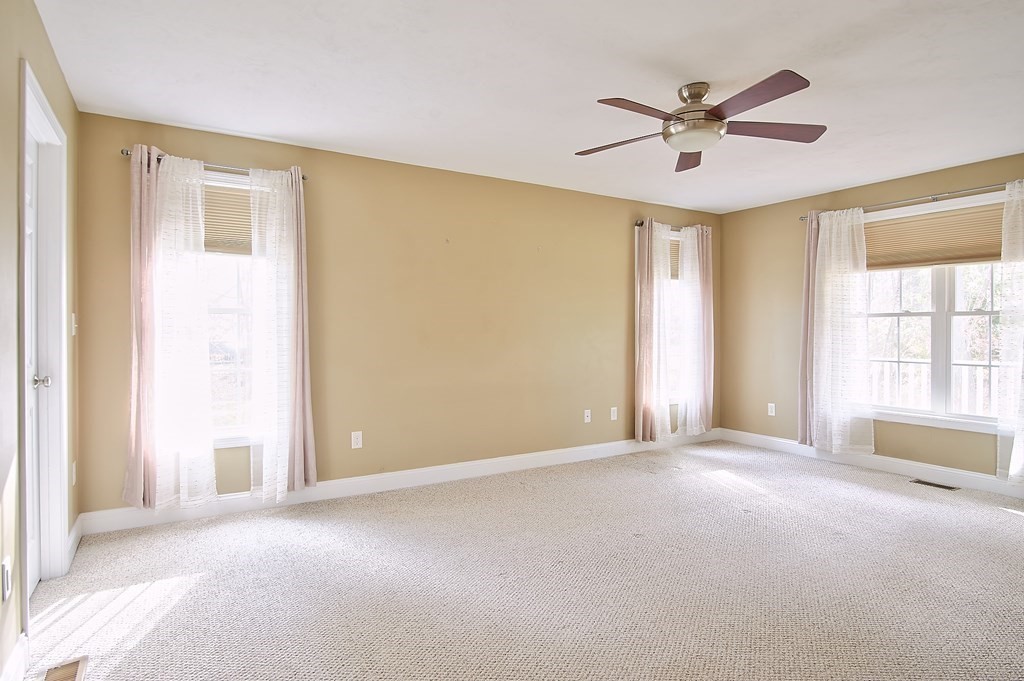 4 Alyssa Drive Townsend, MA 01469 - Photo 15 of 35 a view of a livingroom with a ceiling fan and window