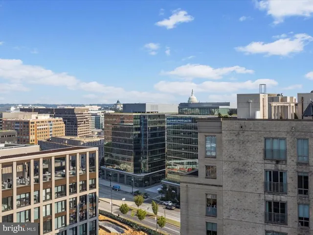 a view of a city with tall buildings