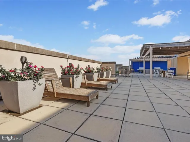 a outdoor space with lots of tables and chairs