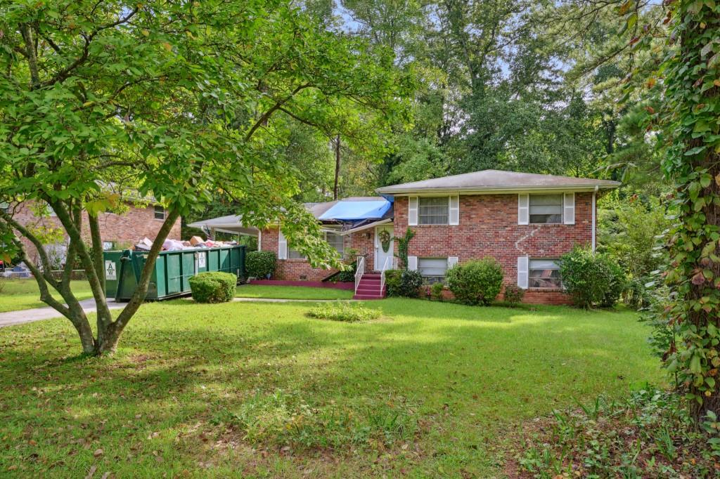 1598 Melanie Court Decatur, GA 30032 - Photo 1 of 1 a front view of a house with a yard