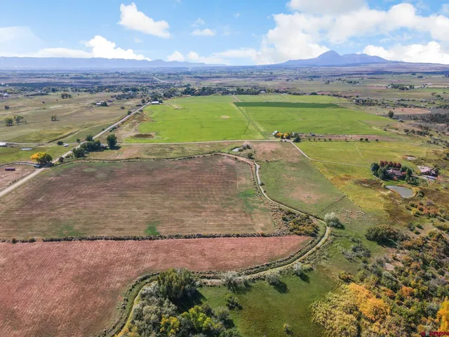 a view of a water with a mountain in the background