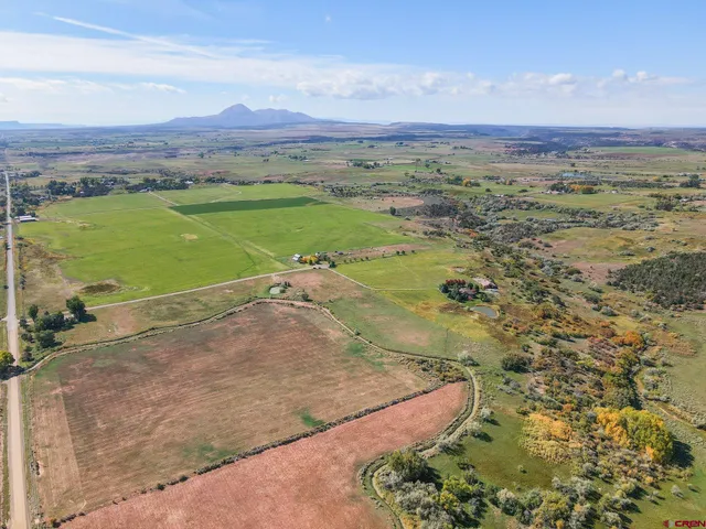 a view of an ocean and a mountain