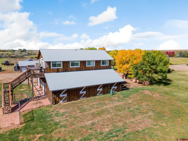 a view of a house with roof deck