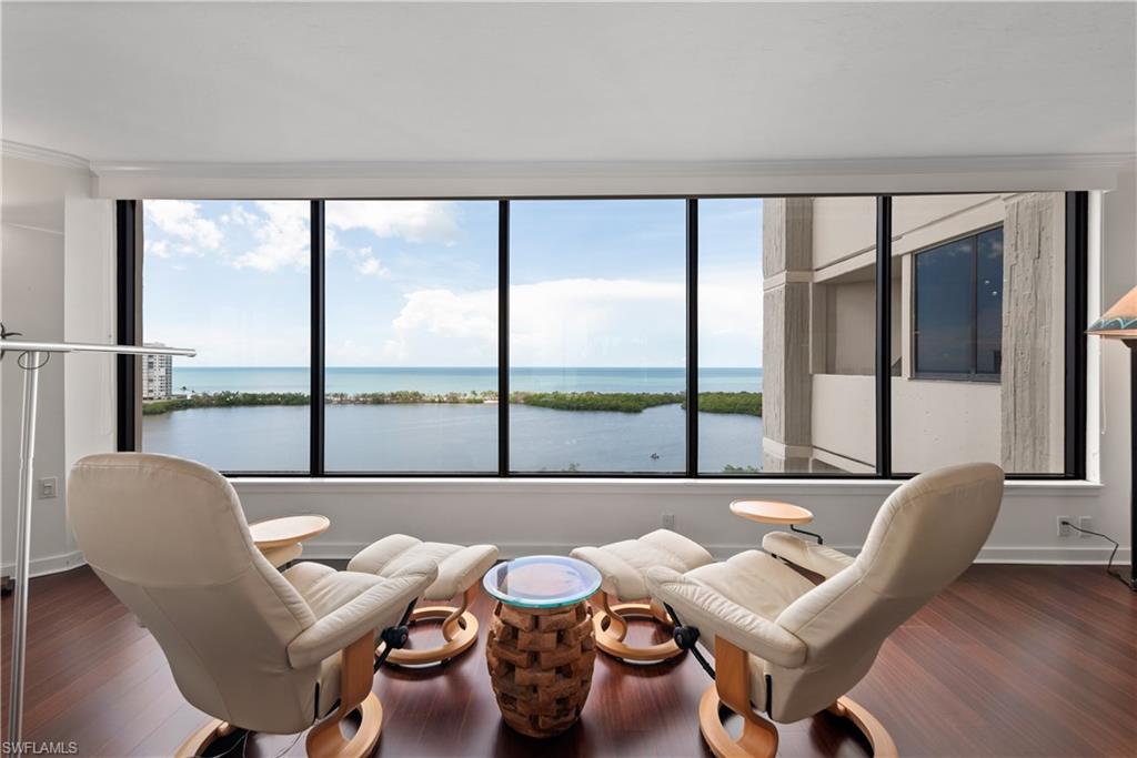 5555 Heron Point Drive, Unit 1202 Naples, FL 34108 - Photo 13 of 36 a view of a city from a dining room with furniture window and outside view