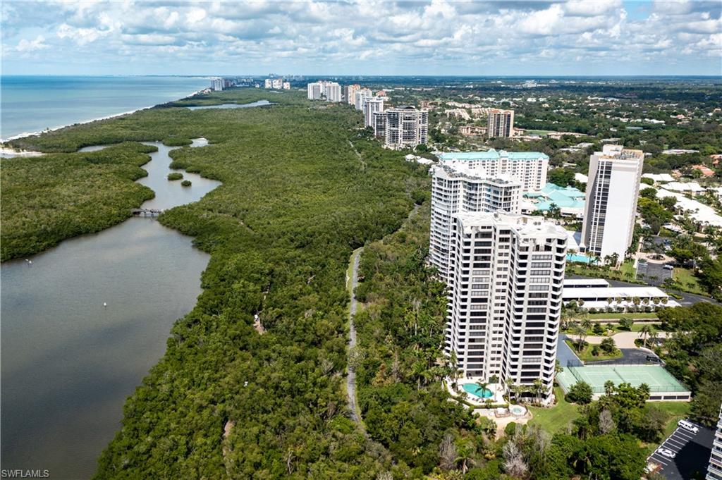 5555 Heron Point Drive, Unit 1202 Naples, FL 34108 - Photo 36 of 36 a view of building with outdoor space