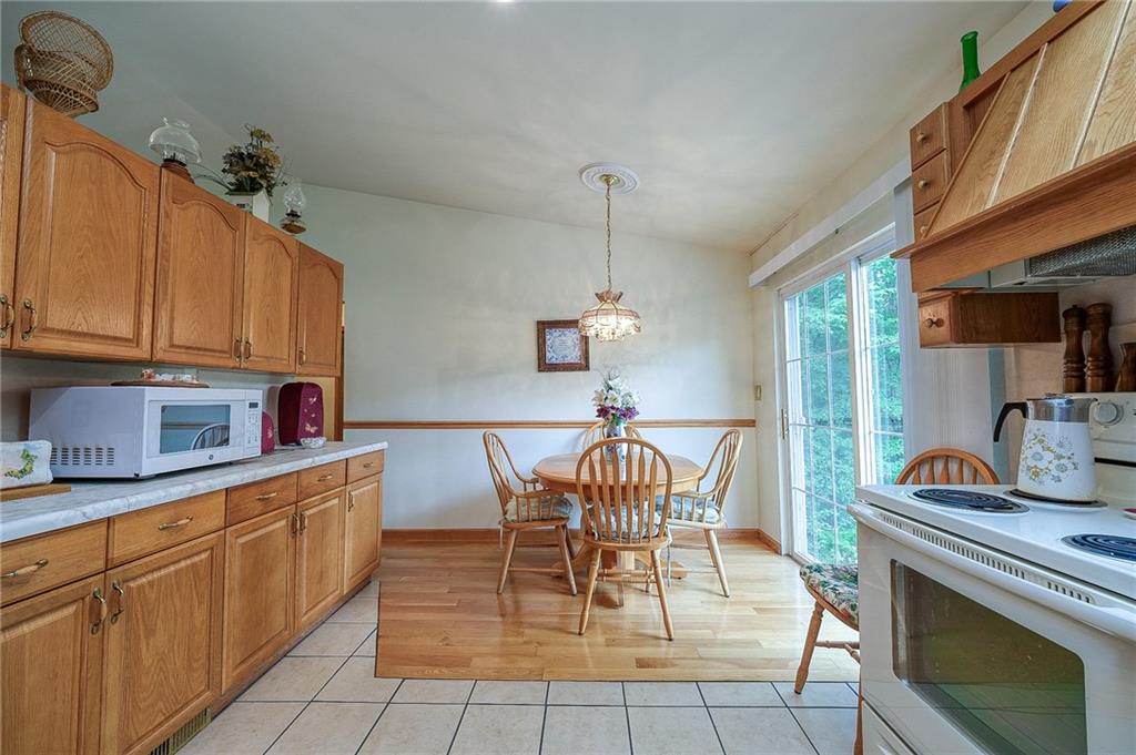 285 Glade Run Road Renfrew, PA 16053 - Photo 8 of 25 a view of a dining room with furniture window and outside view