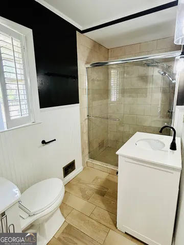 a bathroom with a sink and a shower