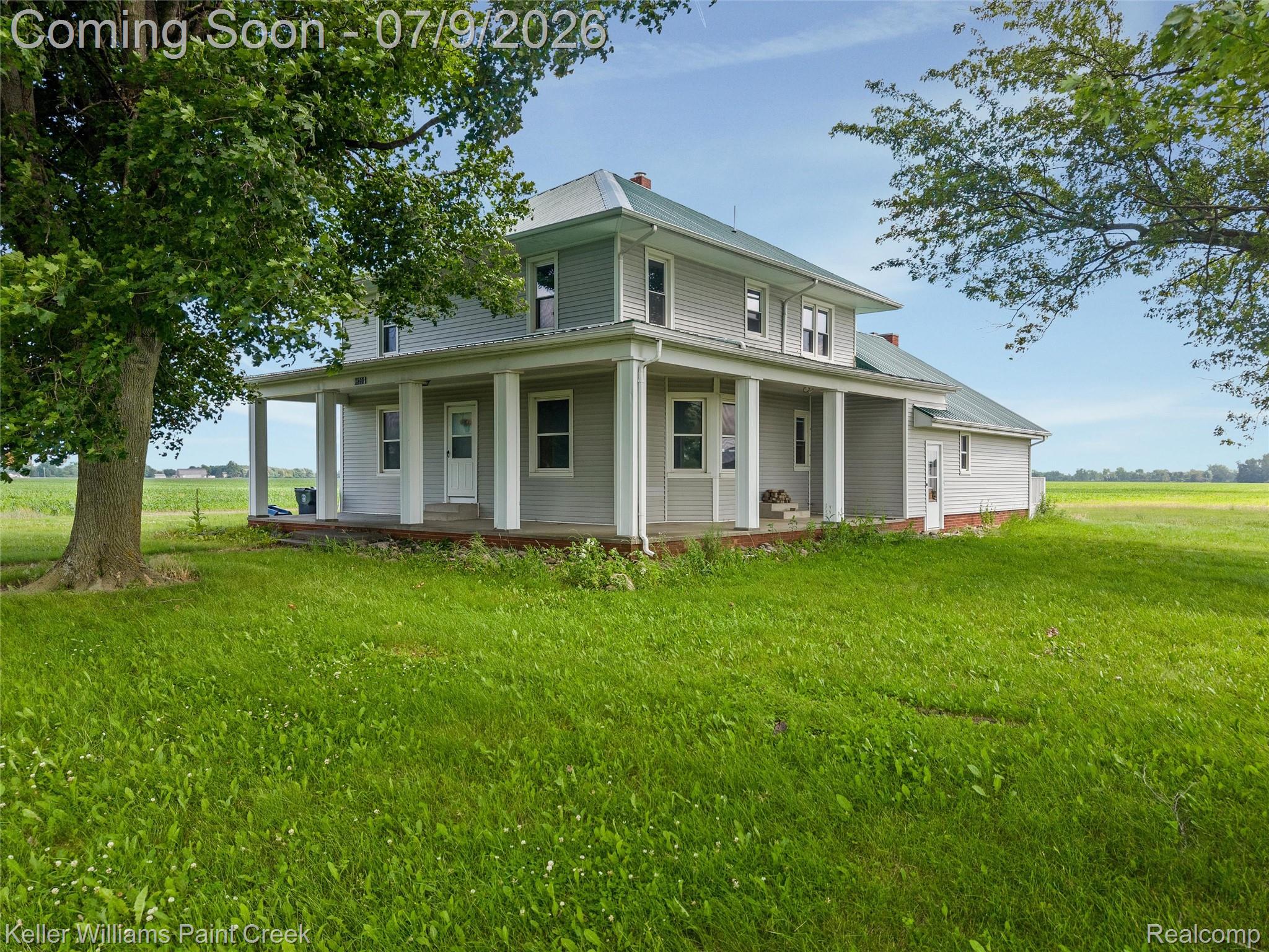 28780 School Section Road Richmond, MI 48062 - Photo 50 of 50 Two-story residence with a wrap-around porch and a light gray siding exterior