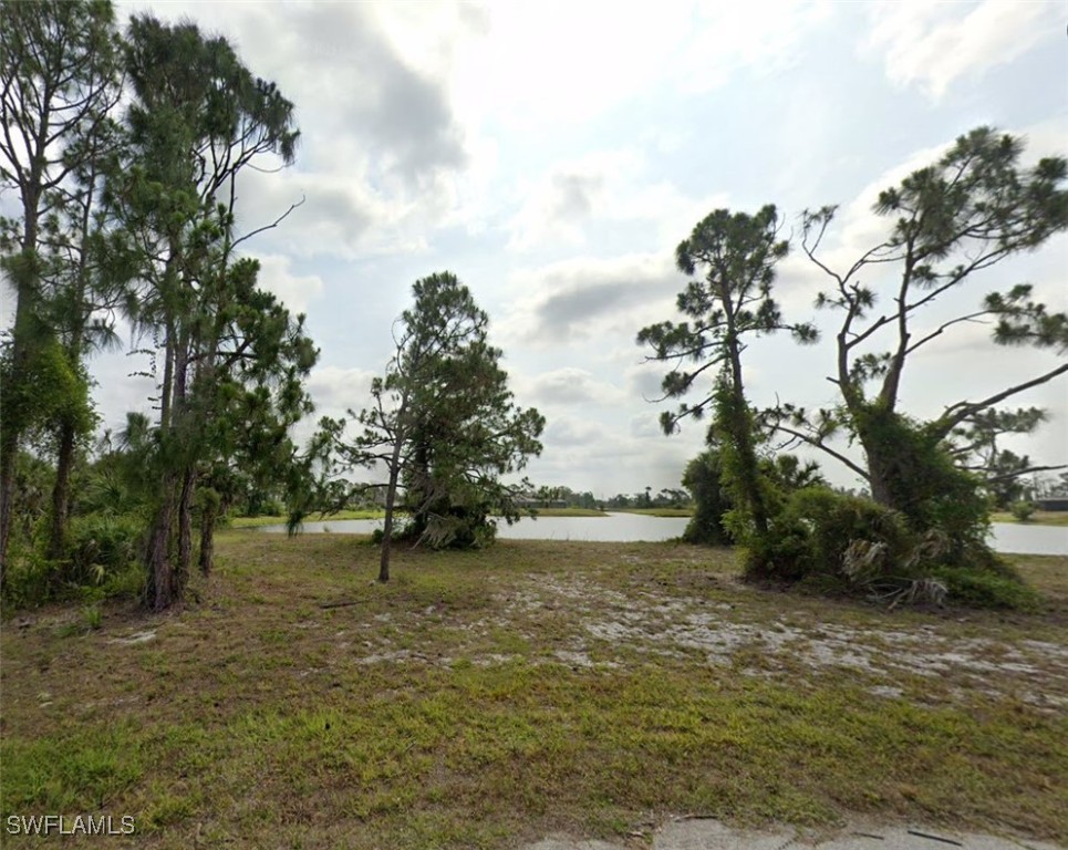 5 Cutter Road Placida, FL 33946 - Photo 2 of 7 a view of outdoor space with deck and trees