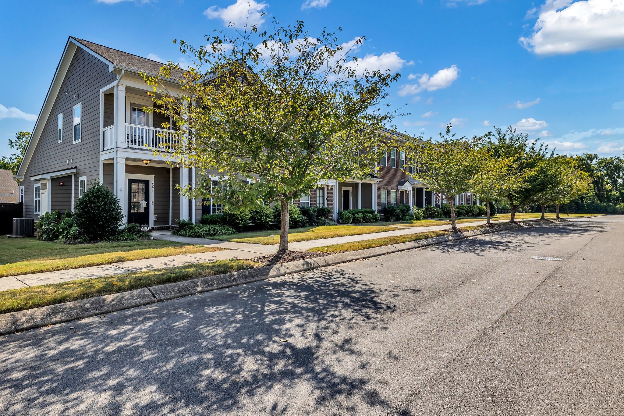 2091 Hemlock Drive Spring Hill, TN 37174 - Photo 2 of 25 a house with palm tree in front of it