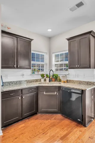 a bedroom with a bed and a ceiling fan