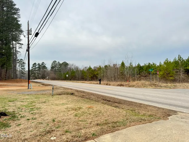 a view of a lake with a large trees