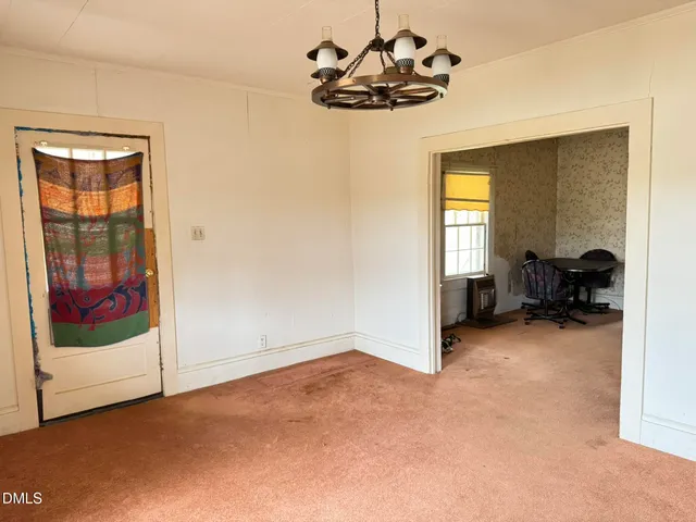 a view of a livingroom with a staircase