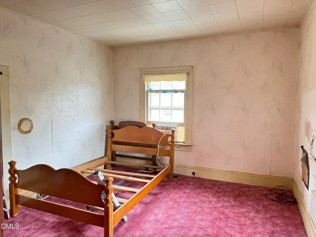 a room with furniture and a window