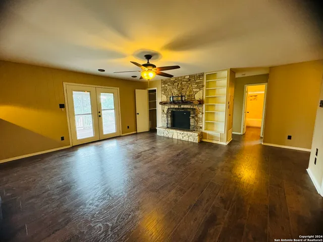 a view of a livingroom with a kitchen