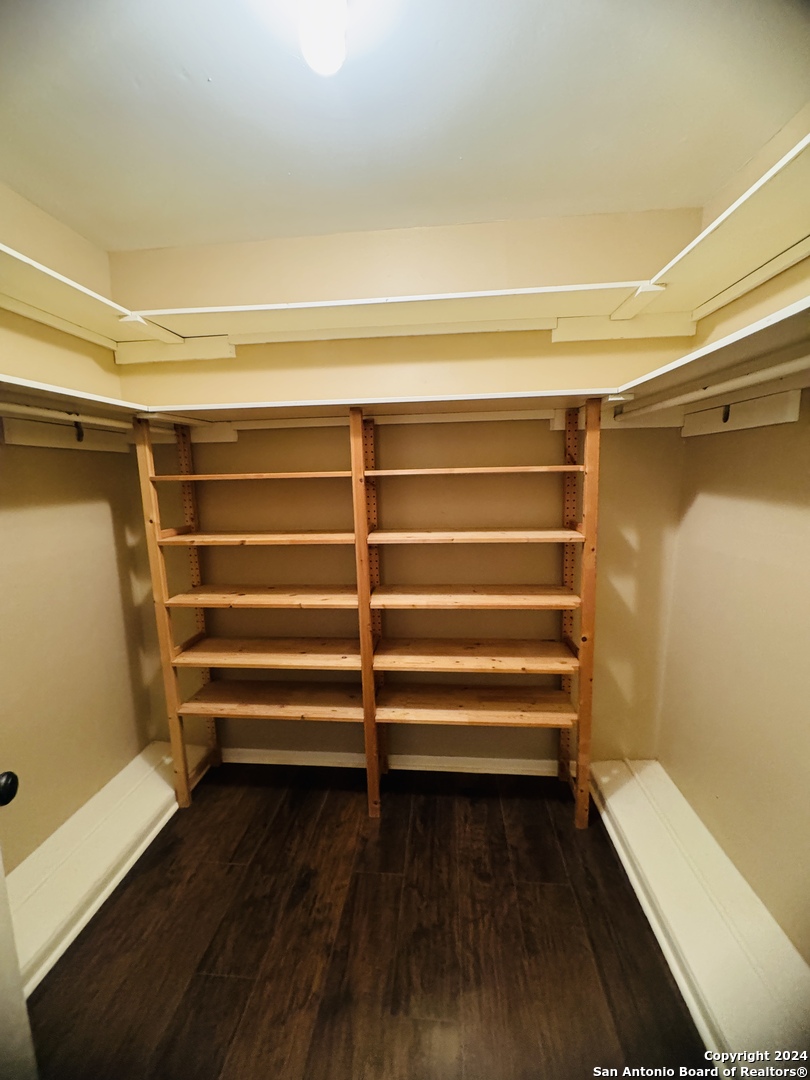 440 Cedar Springs Drive Spring Branch, TX 78070 - Photo 24 of 48 a view of walk in closet with empty racks
