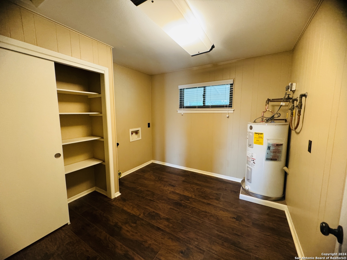 440 Cedar Springs Drive Spring Branch, TX 78070 - Photo 25 of 48 a view of storage and utility room with wooden floor