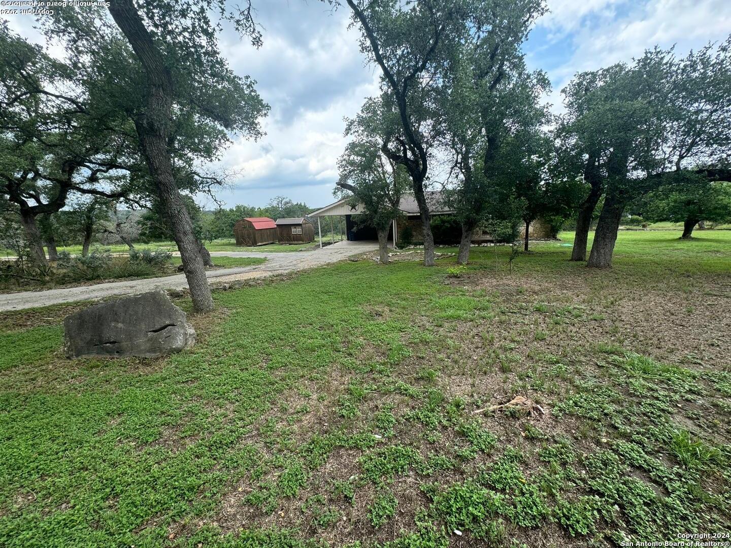 440 Cedar Springs Drive Spring Branch, TX 78070 - Photo 4 of 48 a view of outdoor space with deck and trees