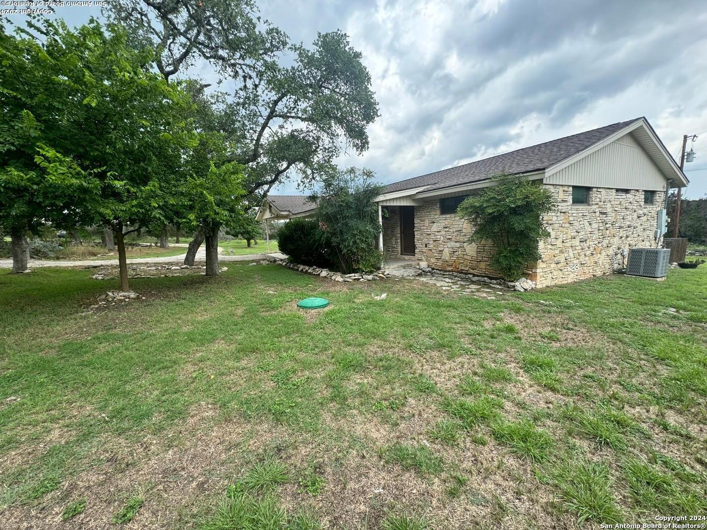 440 Cedar Springs Drive Spring Branch, TX 78070 - Photo 6 of 48 a view of house with yard