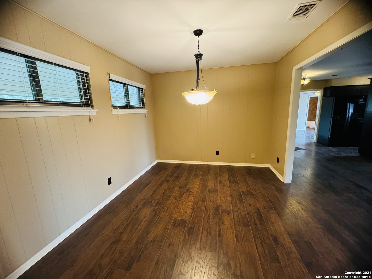 440 Cedar Springs Drive Spring Branch, TX 78070 - Photo 8 of 48 a view of a room with wooden floor and chandelier