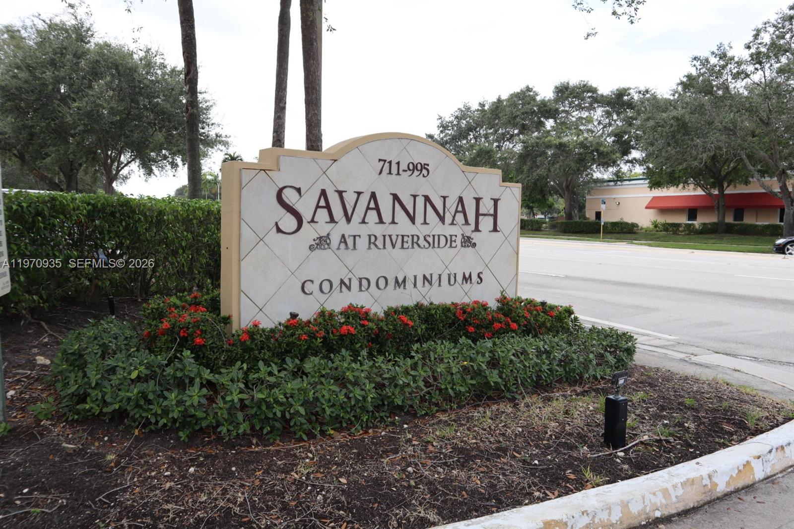 a sign on the side of the road