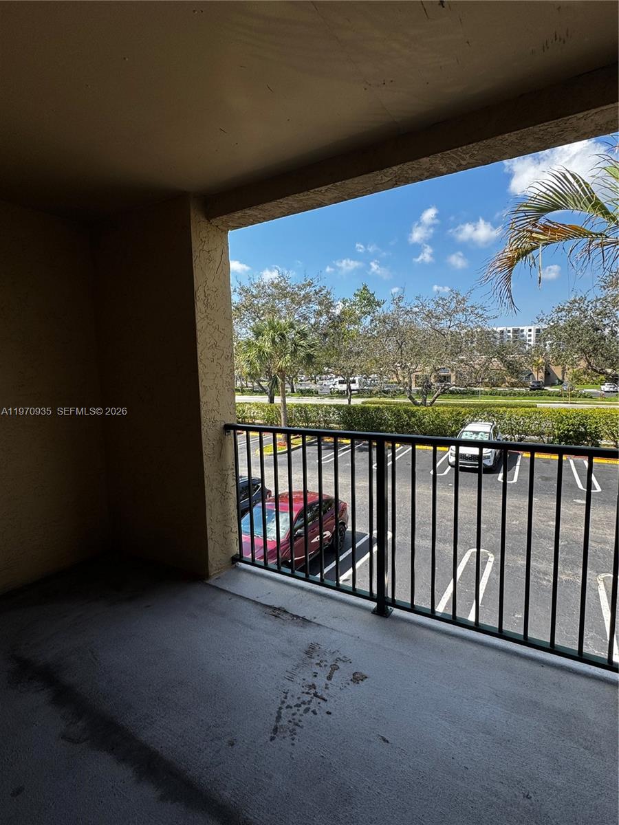 977 Riverside Drive, Unit 221 Coral Springs, FL 33071 - Photo 9 of 17 a view of balcony with furniture