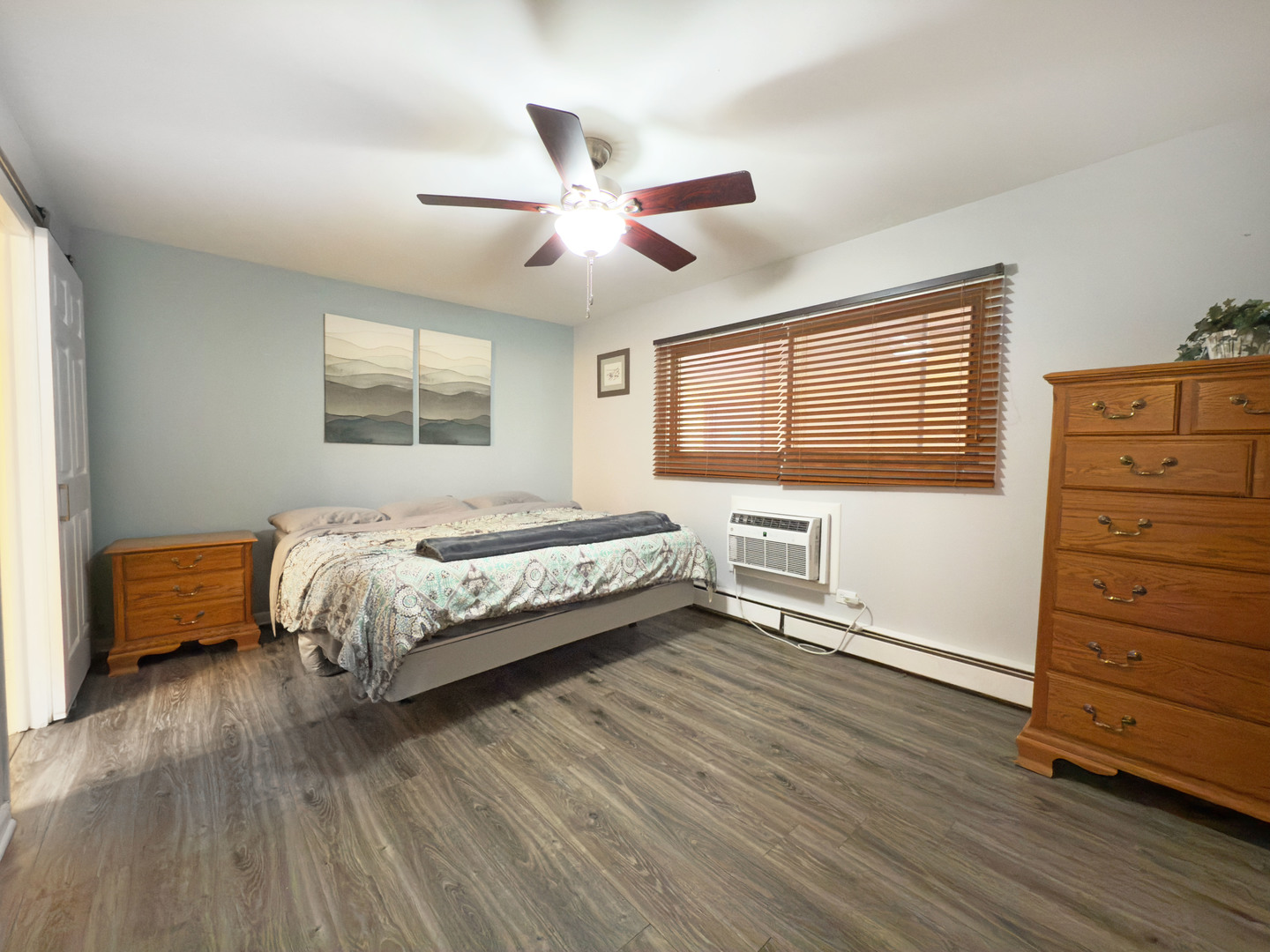 1313 Rebecca Road, Unit 118 Lombard, IL 60148 - Photo 12 of 19 a bedroom with a bed and a dresser