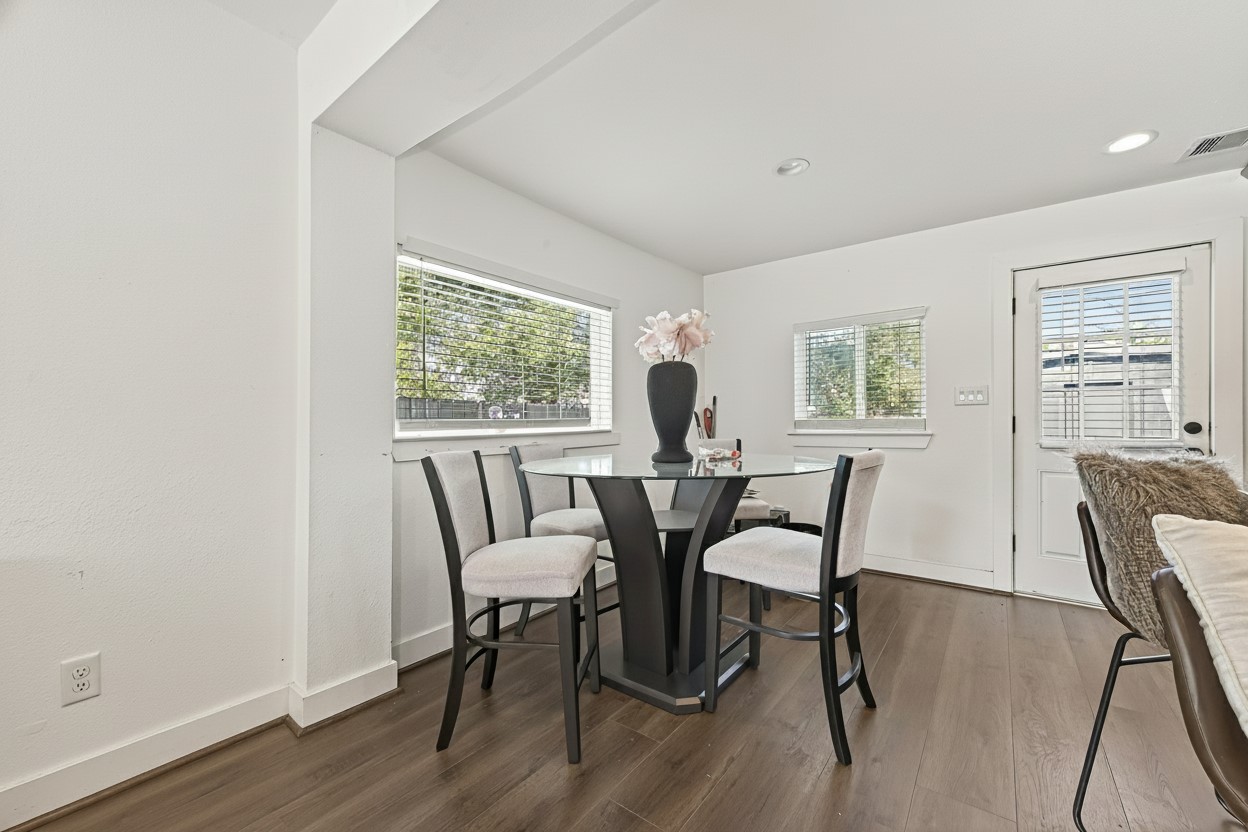 978 St Clair Street Houston, TX 77088 - Photo 6 of 14 a view of a dining room with furniture and a window