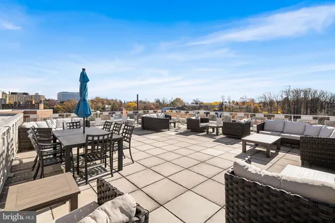 a view of parking space with parked cars