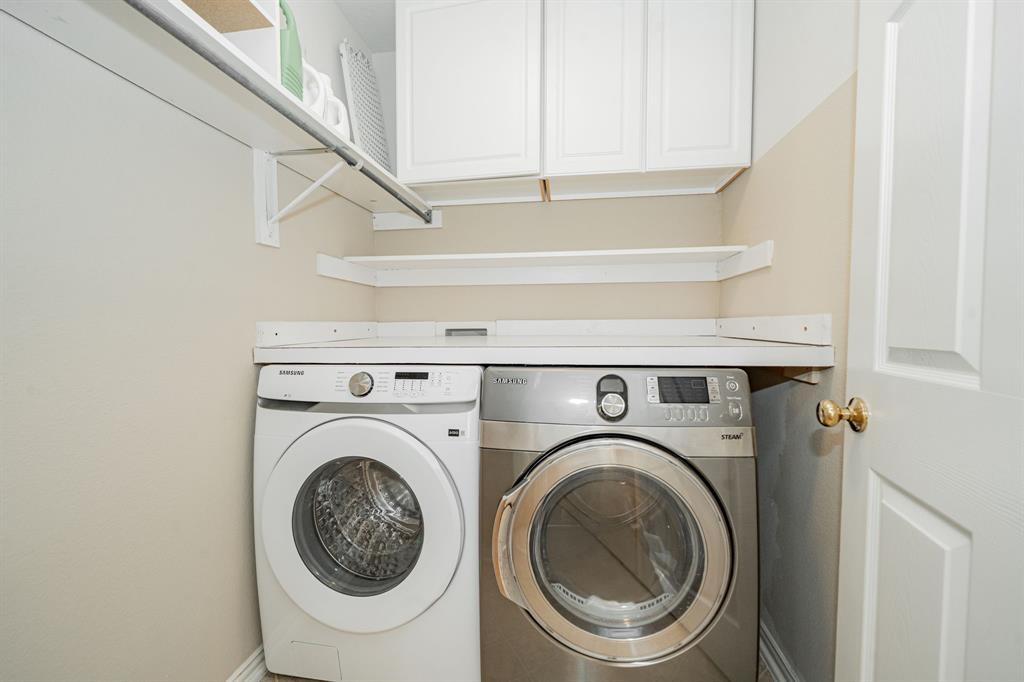 1805 Sumac Drive Flower Mound, TX 75028 - Photo 21 of 40 a utility room with dryer and washer
