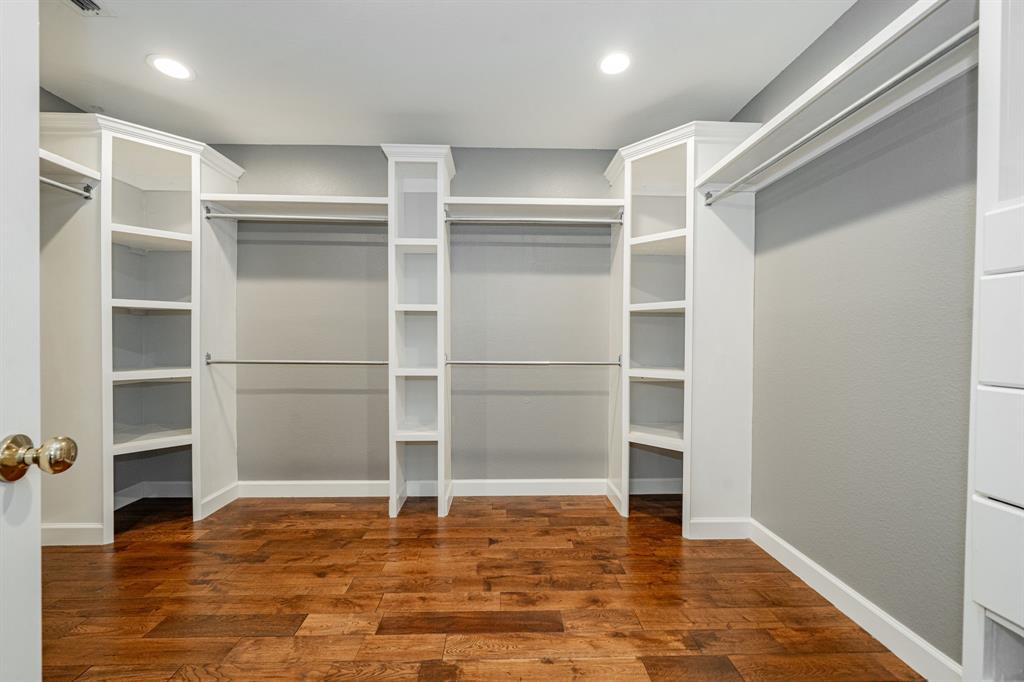 1805 Sumac Drive Flower Mound, TX 75028 - Photo 27 of 40 a view of an empty room with wooden floor and closet