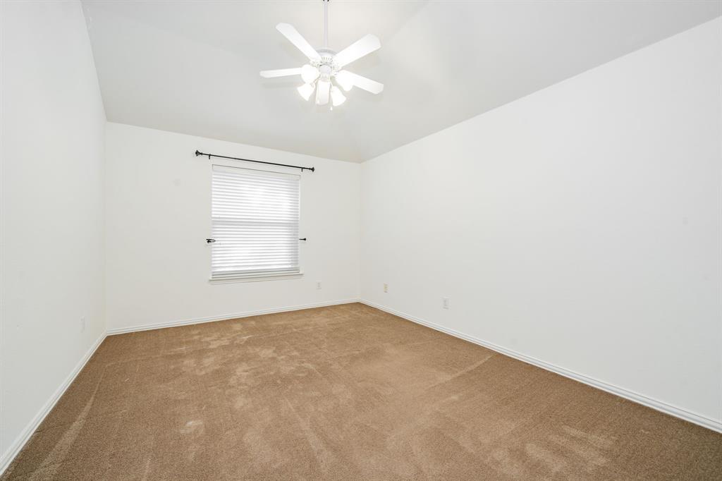 1805 Sumac Drive Flower Mound, TX 75028 - Photo 29 of 40 an empty room with a window