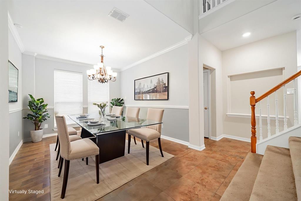 1805 Sumac Drive Flower Mound, TX 75028 - Photo 10 of 40 a dining room with furniture potted plants and wooden floor