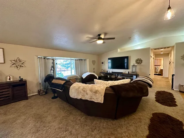 a view of a workspace with furniture