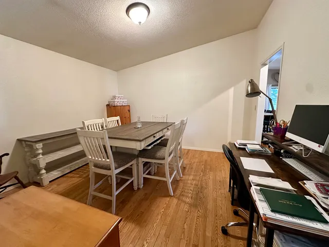 a spacious bedroom with a bed and a couch